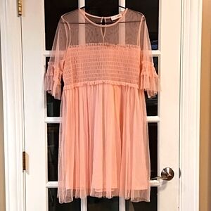 Xtra feminine knee length dress.